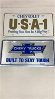 2) Chevrolet truck license plate signs