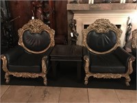 Pair of Ornate chairs and end table.