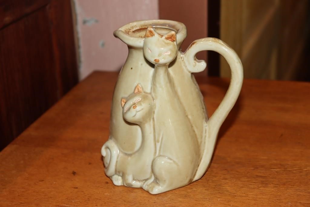 Whimsical cat decorated pottery pitcher