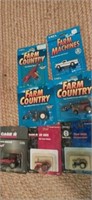 Lot with ertl sealed toy farm equipment models