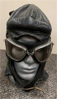 Vintage Leather Aviator's Hat And Goggles On Stand