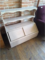 Antique toy box with sliding doors and shelf