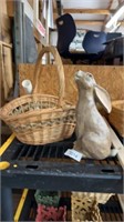 Wicker basket, and carved bunny