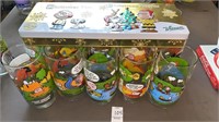 Whitman’s Snoopy tin and Snoopy glass collection