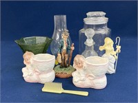 Assorted items including nursery vases, canister,