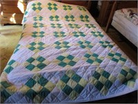Yellow/green checkered quilt
