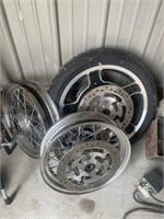 3 Harley motorcycle rims one with Tire