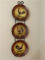 Chicken plates on wall rack; Recipe picture