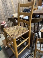 Antique chair with woven seat
