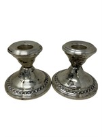 Matching sterling silver candle stick holders