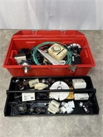 Plastic toolbox with assorted power supplies and