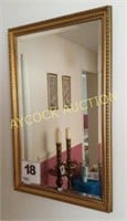 Mirror with gold frame