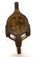 The Ney MFG Co steel pulley w/ wooden wheel