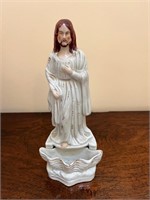 Antique Water Font with Jesus Standing over a