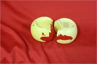 A Pair Of Cheese Form Salt And Pepper Shakers