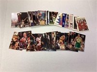 approximately 100 sports cards