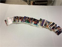 approximately 100 sports cards