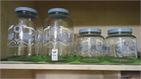 Set of 4 glass jars w/screw-on lids