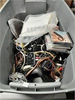 Tote of electronic cables CDs and more