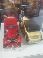 Pair of collectible antique cars one is fire