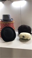 Two hat boxes with hats
Fur hat & fur hand muff