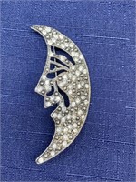 Crescent moon brooch