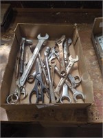 Flat of various wrenches and scissors