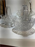 Four glass baskets, multiple patterns