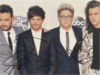 One Direction band signed photo