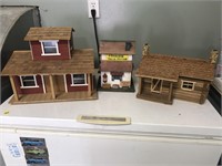 Three houses log cabin, farmhouse, train station
