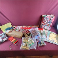 Group of Christmas Wrapping Supplies and Decor