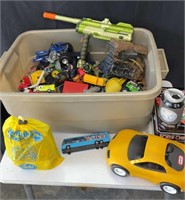Bin of modern and vintage toys. See pics