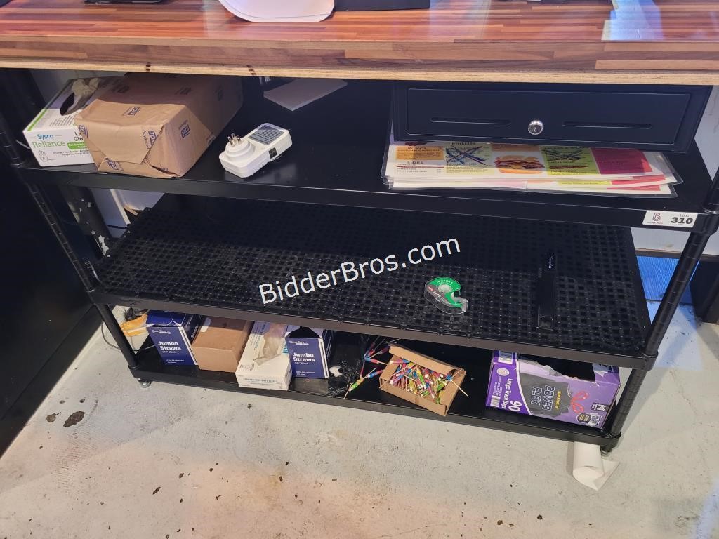 Black shelf, under the counter at bar area