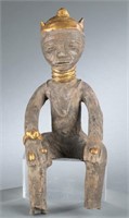 Seated Fante clay grave effigy. 20th century.