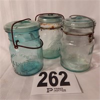 3 GREEN GLASS SNAP TOP CANNING JARS WITH LIDS;