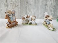 Precious Moments figurines with Rocking horse, cow