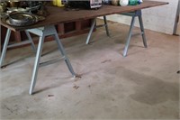 Two Metal Folding Saw Horses & 4' x 8' Plywood