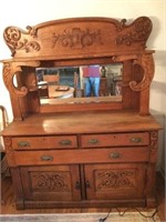 Heavily Carved Oak Sideboard With Beveled Mirror