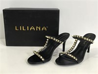 Pair of gold studded black Liliana heels