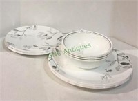 Corelle dinnerware place setting for four.    1930