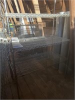 Two sets of 6’ x4’ metal shelves