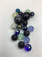 Large marbles (2) - may be shooters.  Small