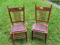 2 Oak chairs carved back