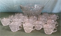 Glass clear punch bowl with 17 glasses and a