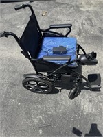 Power wheelchair with charger