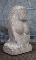 A Mid Century Modern carved limestone nude bust