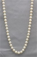 24" 6MM PEARL NECKLACE WITH 14K CLASP.