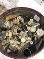 Tin of buttons