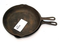 2- Large cast iron pans
