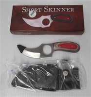 Short skinner hunting knife NIB.
